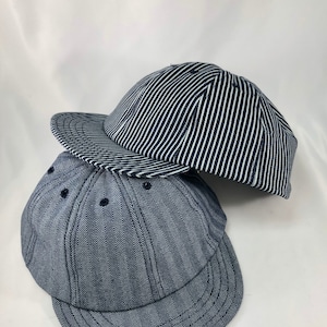 Herringbone or hickory stripe or solid denim eight panel caps. Short visor. Absolutely any size.