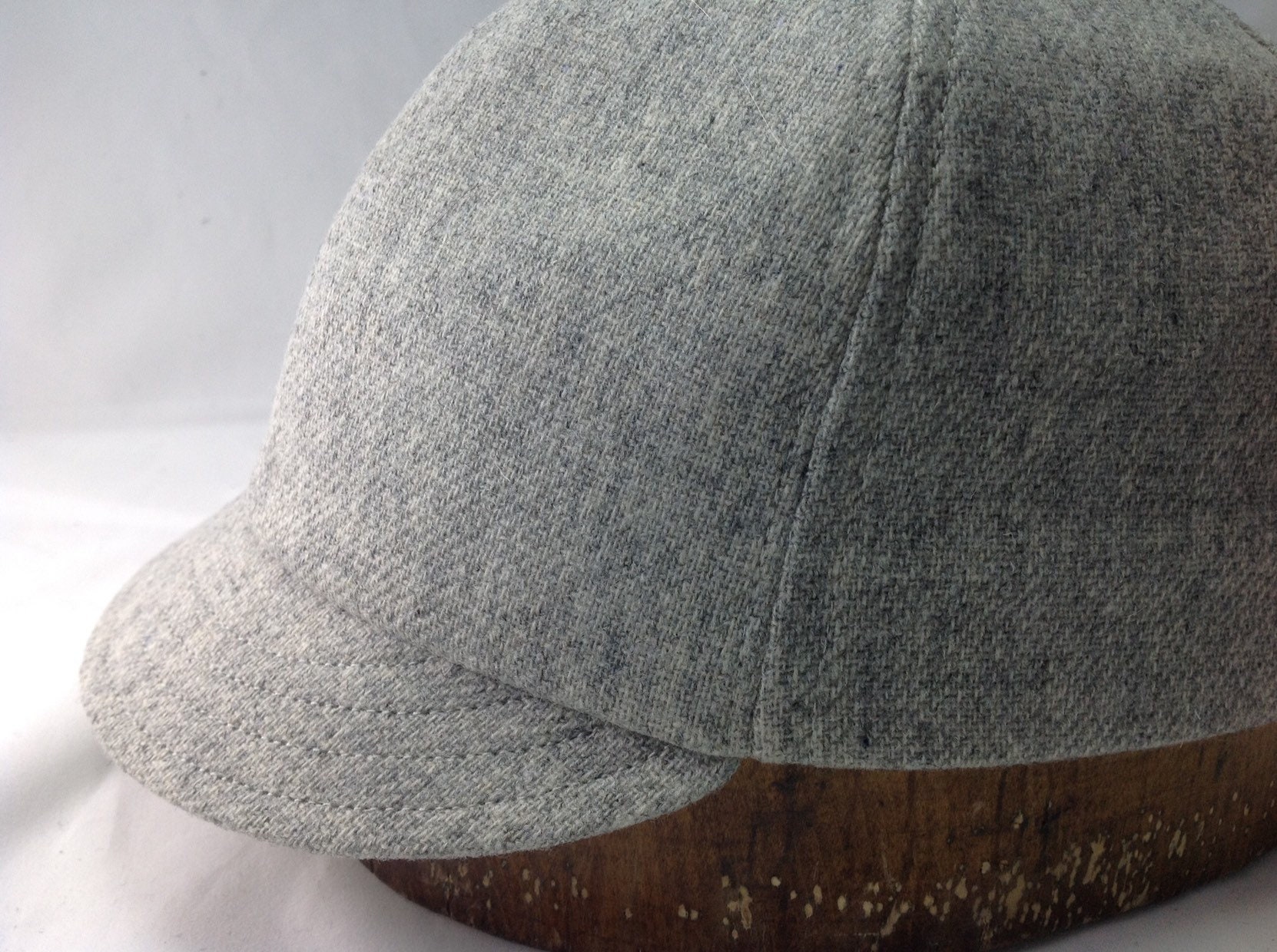 Umpire 1 1/2” short visor on grey wool flannel 6 panel cap. Any size ...