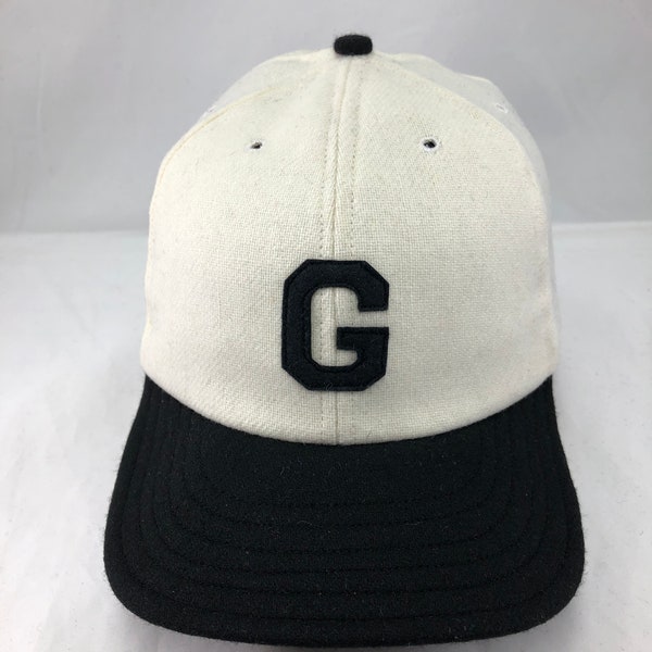 White wool flannel 6 panel cap,  black 2 1/2 in. visor. Hand cut Black G felt logo. Custom hat, Made to order, fitted, any size available.