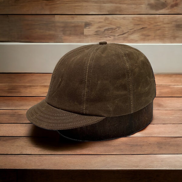 Waxed Cotton 8 panel cap shown with 2” visor. Other lengths available, Hand crafted to order. Fitted to ANY size.