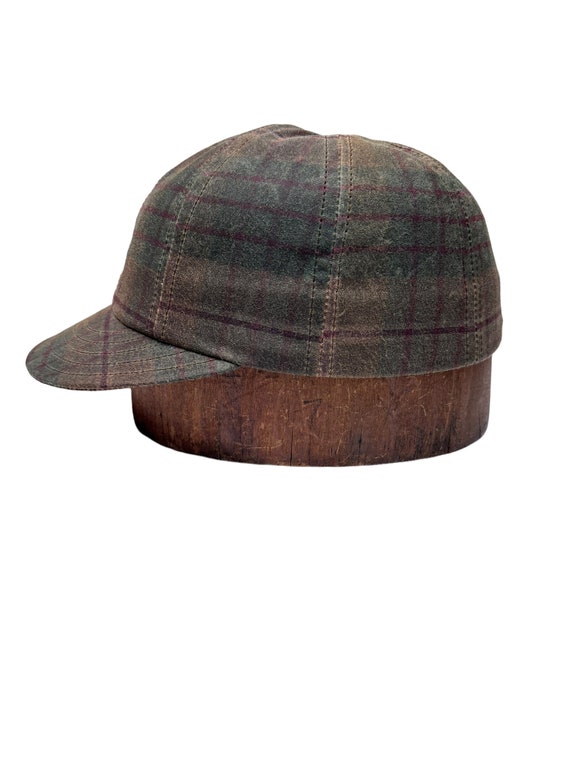 Plaid woven waxed cotton 8 panel cap with 2” visor. Any size cap, various visor lengths available, select at checkout.