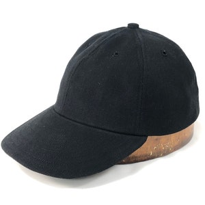 Black denim 6 panel cap with 2”, 2.5” or 3” visor. Select visor length and cap size at checkout.