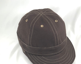 6 panel mechanics cap in brushed cotton canvas, soft visor, Khaki stitching and eyelets, no button. Any size available, select at checkout.