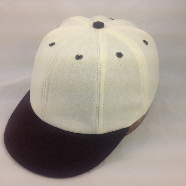 Custom made 8 panel Baseball cap. White wool flannel with brown cotton  1920's visor, fitted with brushed cotton sweatband.