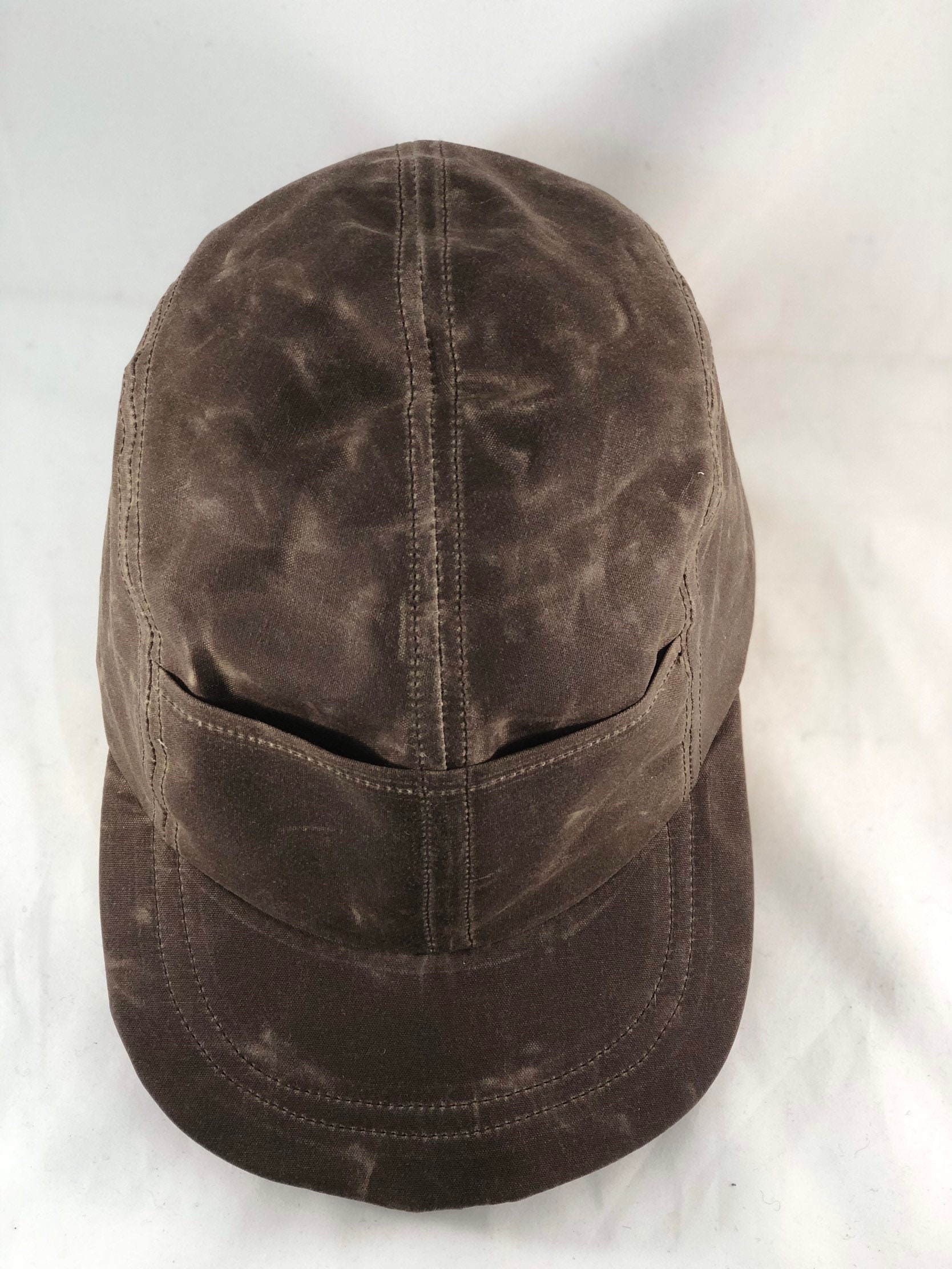Quint Fishing Cap. Waxed cotton 4 panel cap with front pockets. Fitted or adjustable, any size.
