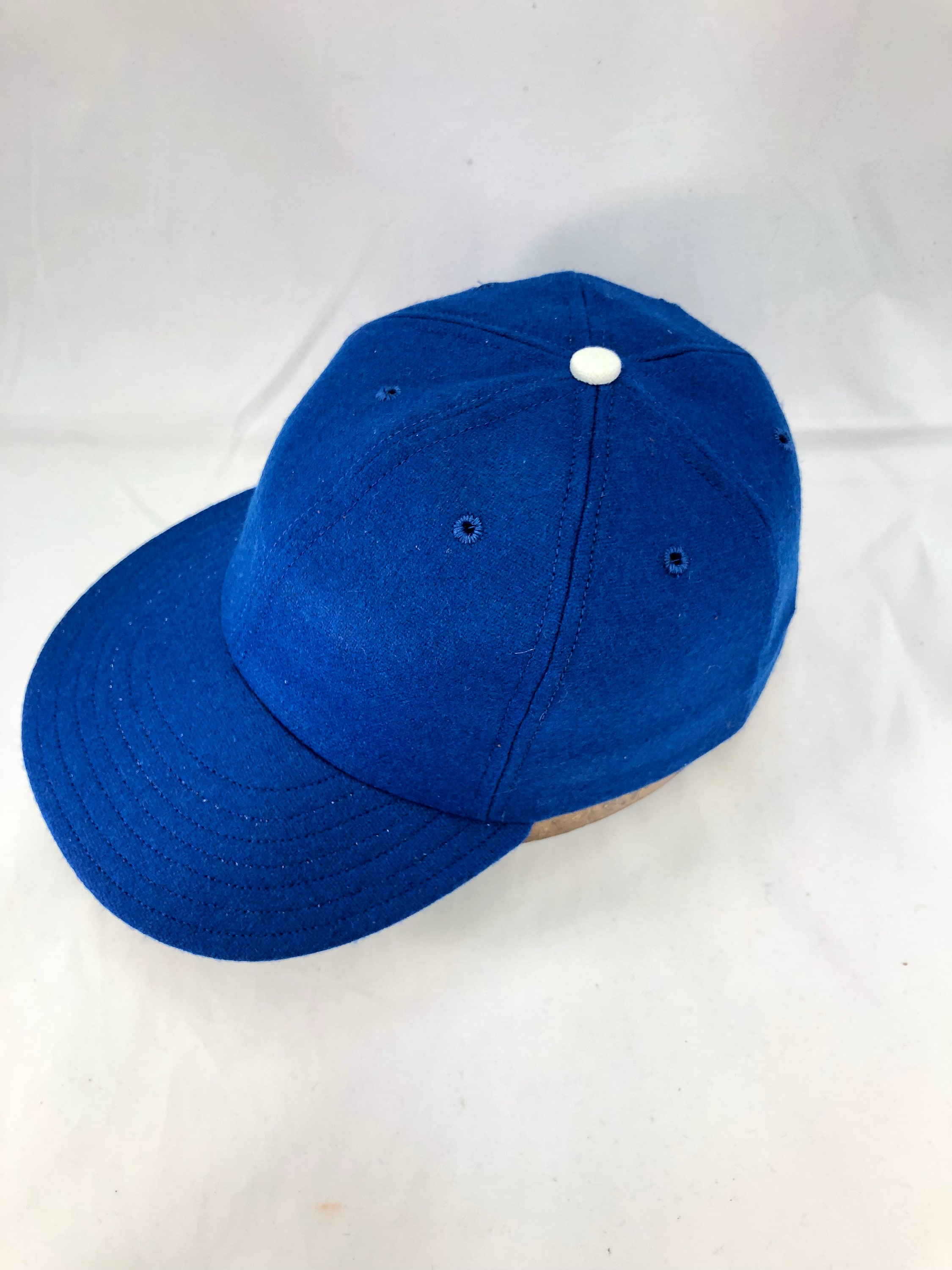 Royal blue melton wool 6 panel cap with 3” visor. Any size available ...