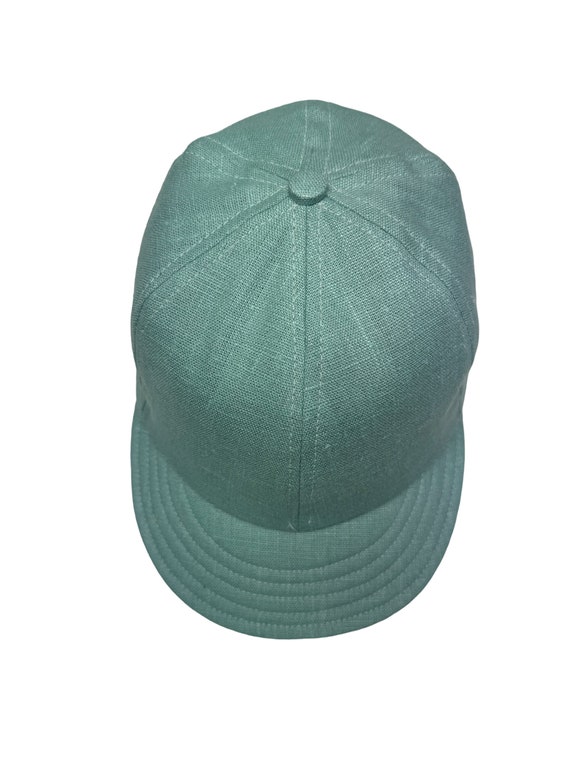 100% linen ballcap, fitted sizes, cotton sweatbands, made in USA, 2, 2.5 or 3” visor lengths. 4 colors. Sea foam green shown in listing.