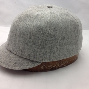 Umpire 1 1/2” short visor on grey wool flannel 6 panel cap. Any size available. Custom made to order. Prefer another color? Email  requests.
