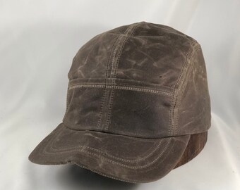 Quint Fishing Cap. Waxed cotton 4 panel cap with front pockets. Fitted or adjustable, any size.