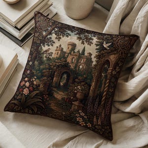 May include: A square throw pillow featuring a detailed tapestry-style woven design of a stone castle surrounded by lush gardens, trees, and floral elements in shades of brown, green, and cream, with a white bird flying in the upper right corner.