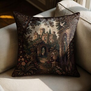 May include: A square throw pillow featuring a detailed tapestry-style woven scene of a stone castle surrounded by lush trees, garden arches, and blooming flowers. The design includes a white bird in flight and a dark brown border frame.