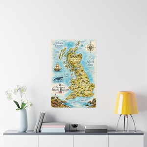 May include: A decorative wall poster featuring a detailed, illustrated map titled The Island of Great Britain. The map displays Scotland, England, and Wales with landmarks, a sailing ship, a whale, and a compass rose against a blue ocean.