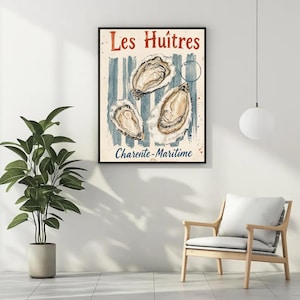 May include: A framed art print featuring three oyster illustrations with the text "Les Huîtres" and "Charente-Maritime". The artwork has a vintage style with blue and red accents, perfect for kitchen or dining room decor.