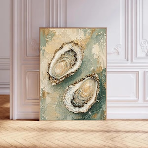 May include: An abstract painting featuring two oyster shells with textured details. The artwork uses a palette of beige, gold, and teal, creating a serene and elegant aesthetic. The painting is framed in a light brown wooden frame.
