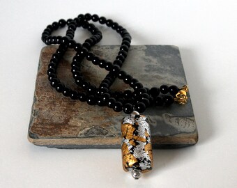 Black Glass Bead Necklace: Polymer Clay Pendant with Gold & Silver Leaf