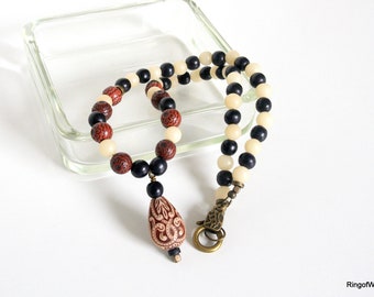 Buri Nut Bead Necklace: Black Wood & Repurposed Plastic Pendant