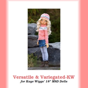 May include: A pink and white knitted sweater with a blue and white patterned design, worn by a doll with blonde hair and a pink and white knitted hat. The doll is standing on a rock. The text "Versatile & Variegated-KW for Kaye Wiggs' 18" MSD Dolls Pattern created by Becky Colvin © 2014" is printed below the image.