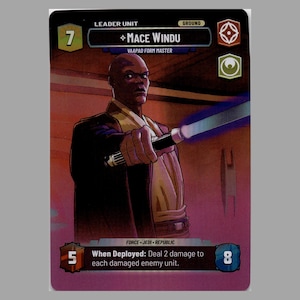 May include: A trading card featuring Mace Windu, a bald character with a lightsaber. The card has a purple and red background with the text "Leader Unit" and "Ground". The card also includes the text "Force - Jedi - Republic".