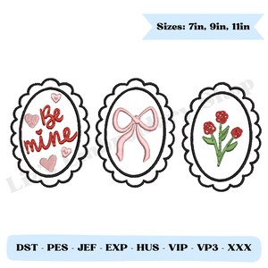 Könnte beinhalten: Drei ovale Stickmuster mit gewellten Rändern. Die Designs beinhalten die Worte "Be mine" mit Herzen, eine rosa Schleife und rote Rosen mit grünen Stielen. Verfügbare Größen: 17,78 cm, 22,86 cm, 27,94 cm.