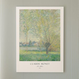 Puede incluir: Una impresión enmarcada de "Los Sauces" de Claude Monet de 1880. La obra representa un paisaje con un río, árboles y un pueblo. La paleta de colores incluye verdes, amarillos y azules, con pinceladas visibles. La impresión está montada sobre un fondo blanco.