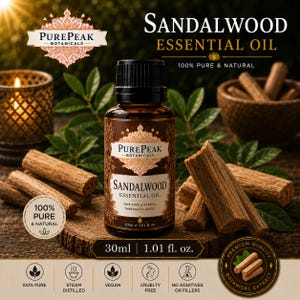 May include: A brown bottle of Sandalwood Essential Oil with a black cap, surrounded by sandalwood sticks and green leaves. The label reads "PurePeak Botanicals" and "100% Pure & Natural". The bottle contains 1.01 fl. oz. of oil.
