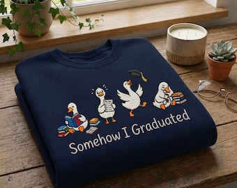 Custom Name Embroidered Somehow I Graduated Sweatshirt Funny Duck Graduation Crewneck Student Gift College Outfit Apparel