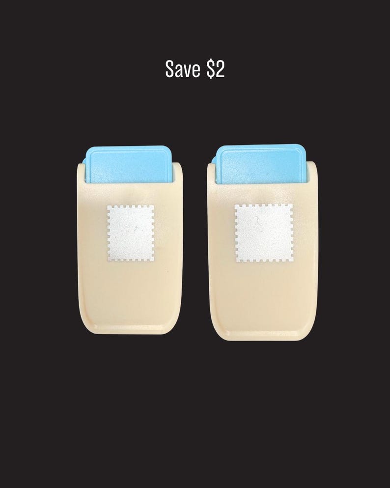 May include: Two beige paper punches with light blue top levers and a square stamp-shaped icon on the front. The text Save $2 is positioned above the two tools, which feature a rectangular body and a mechanism for creating paper cutouts.