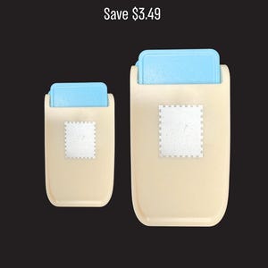 May include: Two beige paper punches with light blue top levers, each featuring a silver square stamp-shaped icon on the front. The text Save $3.49 is displayed above the tools, which are designed to create square shapes with scalloped edges.