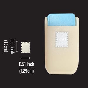 May include: A beige craft punch with a light blue lever, featuring a stamp-shaped cutout design. The punch creates a shape measuring 0.63 inches in height and 0.51 inches in width, as indicated by the measurement labels next to the tool.