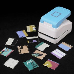 May include: A light blue and white paper punch tool with a square stamp-shaped icon on top, accompanied by several small, square paper cutouts with scalloped edges featuring various colorful patterns and designs.