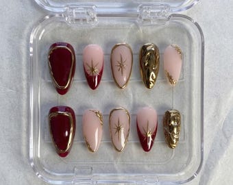 Luxury Red Gold Press On Nails, Starburst Chrome Nails, Burgundy Holiday Nails, Glam Almond Nails, Christmas Party Nails