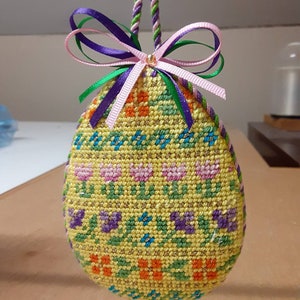 Oval Ornament Needlepoint Finishing Service: Flat Back, Puffy Front with Twisted Trim and Bows