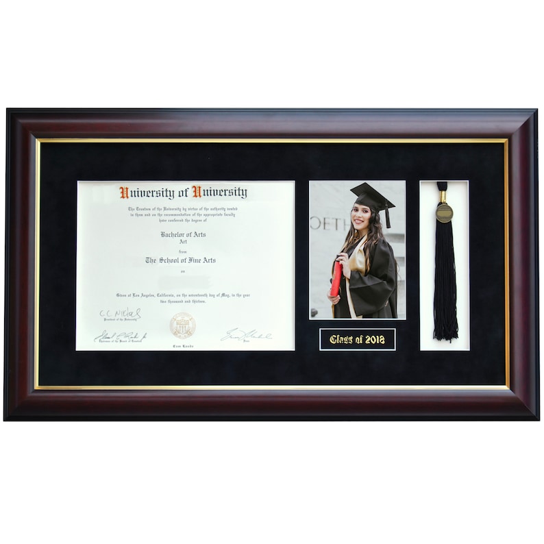 May include: A framed diploma with a black tassel and a photo of a graduate wearing a cap and gown. The diploma is for a Bachelor of Arts degree from the University of University. The photo is captioned "Class of 2018".