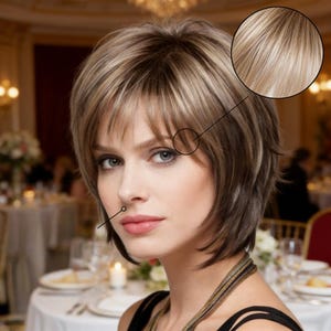 Puede incluir: Un juego de tres cuencos de cerámica anidados en tamaños graduados. Los cuencos presentan un acabado moteado y mate en tonos crema, marrón claro y marrón oscuro. El cuenco más grande mide unos 20 cm de diámetro.