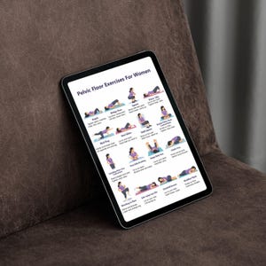 May include: A black tablet displays a guide titled "Pelvic Floor Exercises For Women." The guide features illustrated exercises with instructions. The tablet is positioned on a brown surface, suggesting a comfortable setting for reference.