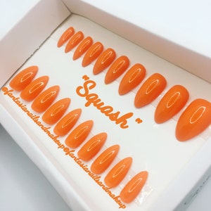 Fake nails, orange pumpkin nails, press ons, stiletto nails, glue on nails, false nails, Fall nails, Thanksgiving nails, acrylic nails