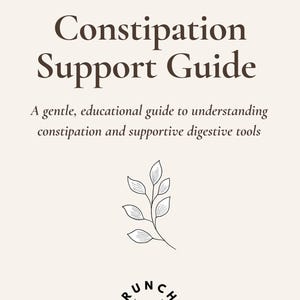 May include: A beige guide titled "Constipation Support Guide" with dark brown text. The guide includes the text "A gentle, educational guide to understanding constipation and supportive digestive tools." A line drawing of leaves is below the text, and the logo "Crunchy Momma Rox" is at the bottom.