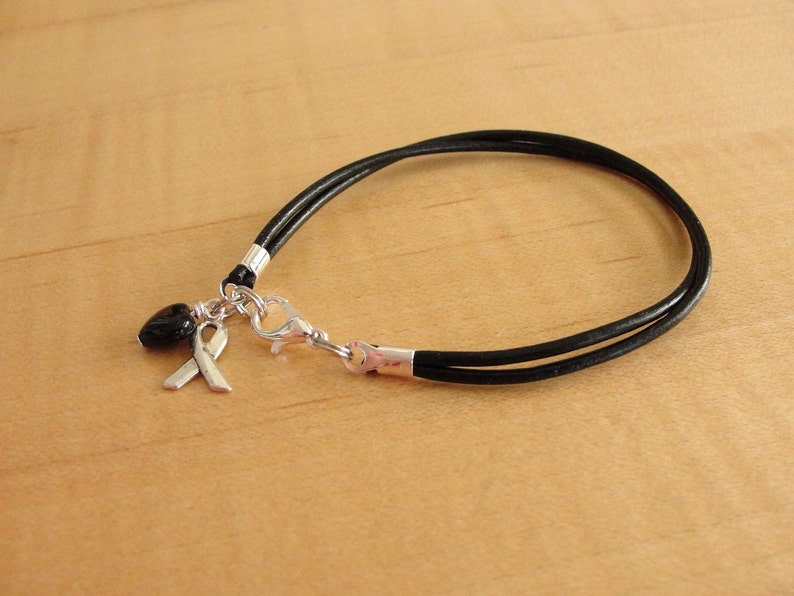 Black Awareness Bracelet Leather Melanoma, Narcolepsy, Sleep Apnea & Other Sleep Disorders, Trauma, Suicide Plain Ribbon Charm