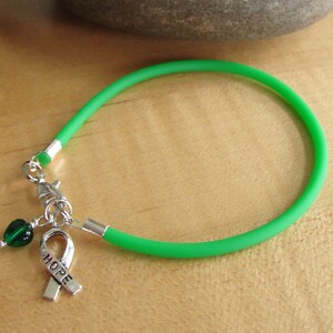 Green Awareness Bracelet Rubber Cerebral Palsy, Glaucoma, Kidney Disease, Liver Cancer, Organ Donation, Mitochondrial Disease, HPV image 3