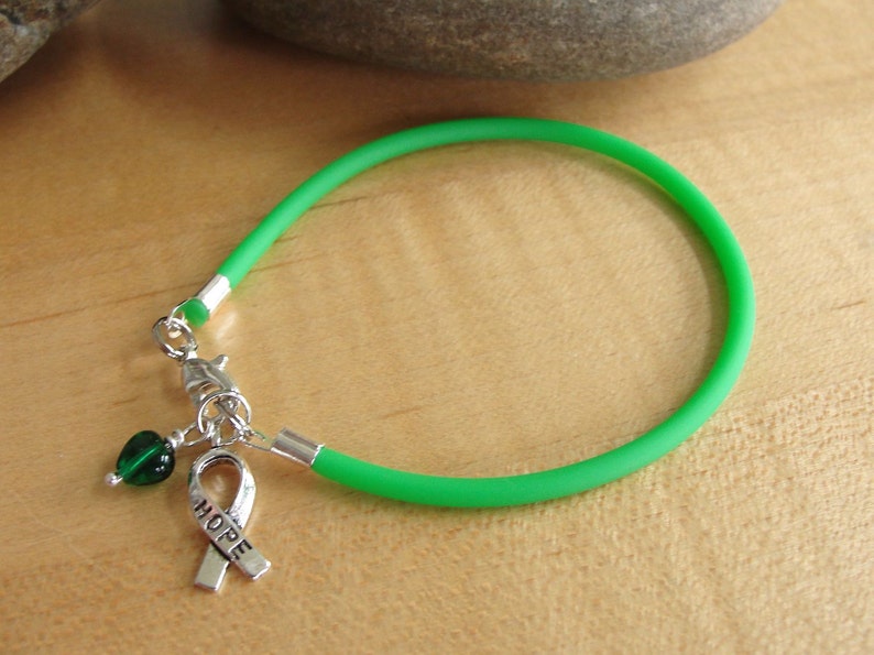 Green Awareness Bracelet Rubber Cerebral Palsy, Glaucoma, Kidney Disease, Liver Cancer, Organ Donation, Mitochondrial Disease, HPV image 3