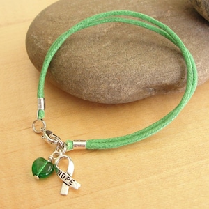 Pulsera de concienciación ecológica (algodón) Parálisis cerebral, glaucoma, enfermedad renal, cáncer de hígado, donación de órganos y más