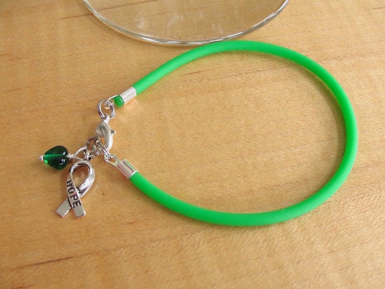 Green Awareness Bracelet Rubber Cerebral Palsy, Glaucoma, Kidney Disease, Liver Cancer, Organ Donation, Mitochondrial Disease, HPV image 4