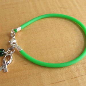 Green Awareness Bracelet Rubber Cerebral Palsy, Glaucoma, Kidney Disease, Liver Cancer, Organ Donation, Mitochondrial Disease, HPV HOPE Ribbon Charm