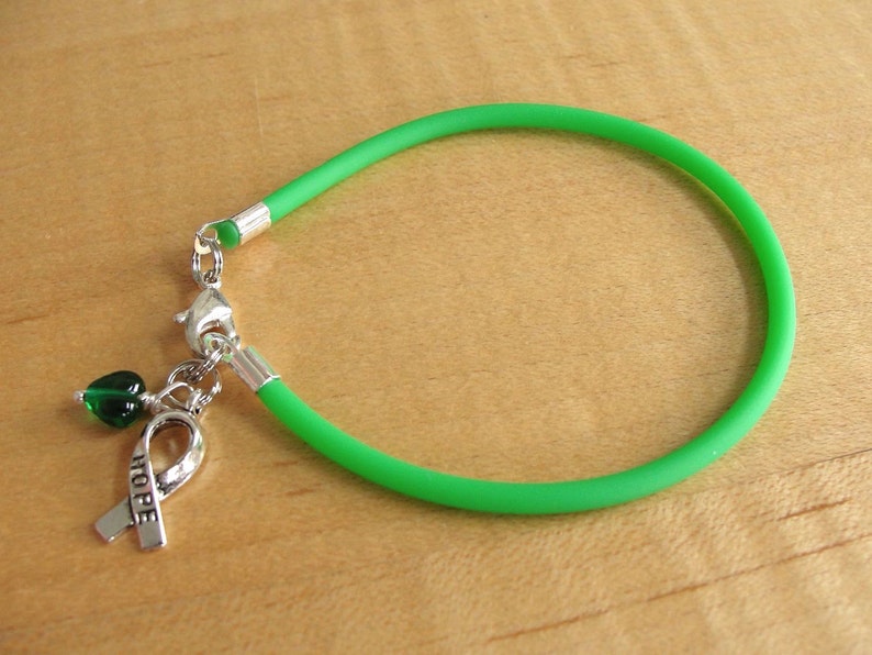 Green Awareness Bracelet Rubber Cerebral Palsy, Glaucoma, Kidney Disease, Liver Cancer, Organ Donation, Mitochondrial Disease, HPV HOPE Ribbon Charm