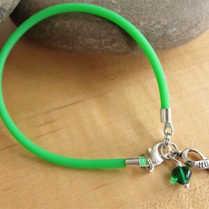 Green Awareness Bracelet Rubber Cerebral Palsy, Glaucoma, Kidney Disease, Liver Cancer, Organ Donation, Mitochondrial Disease, HPV image 2