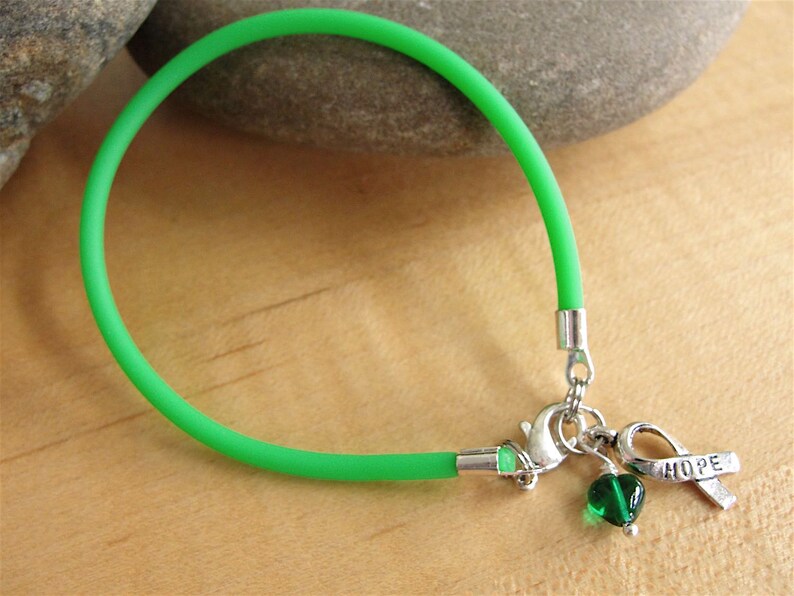 Green Awareness Bracelet Rubber Cerebral Palsy, Glaucoma, Kidney Disease, Liver Cancer, Organ Donation, Mitochondrial Disease, HPV image 2