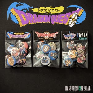 May include: Three packs of Dragon Quest button pins. Each pack contains several round pins with colorful character illustrations. The top of the image features the Dragon Quest logo in purple, yellow, and blue.