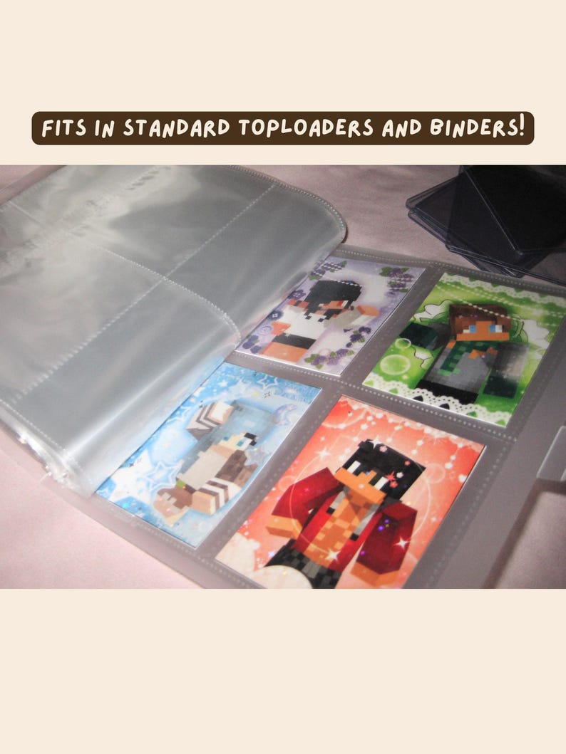 May include: A clear plastic binder page with four rectangular slots containing printed cards featuring pixelated character illustrations. The text "FITS IN STANDARD TOPLOADERS AND BINDERS!" is displayed at the top. Several empty clear plastic toploaders are visible.