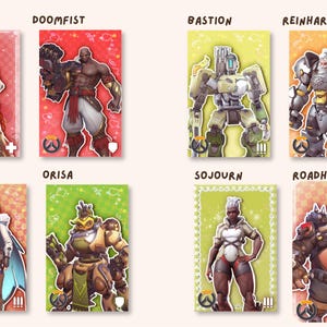 May include: A collection of eight rectangular trading cards featuring Overwatch characters Illari, Doomfist, Bastion, Reinhardt, Freja, Orisa, Sojourn, and Roadhog. Each card displays a unique character illustration against a vibrant, patterned background.