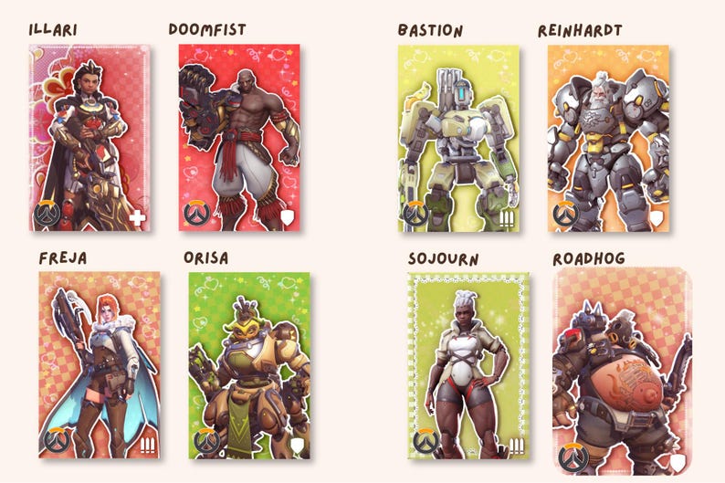 May include: A collection of eight rectangular trading cards featuring Overwatch characters Illari, Doomfist, Bastion, Reinhardt, Freja, Orisa, Sojourn, and Roadhog. Each card displays a unique character illustration against a vibrant, patterned background.